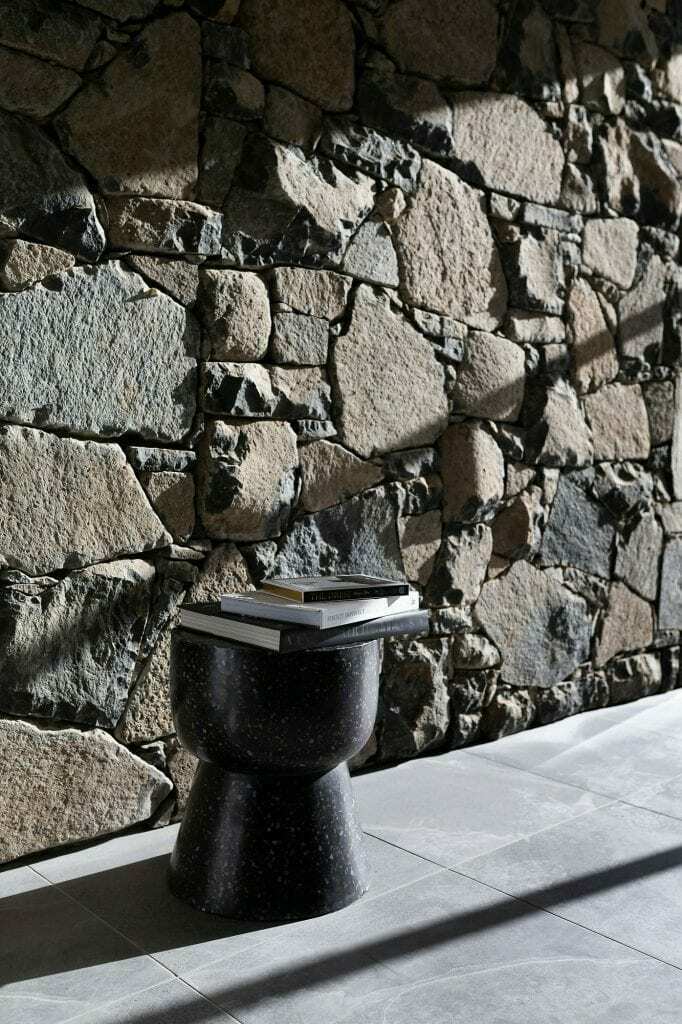 Homes by Howe, knock down rebuild, Deakin, drystone wall closeup, shadows and chair