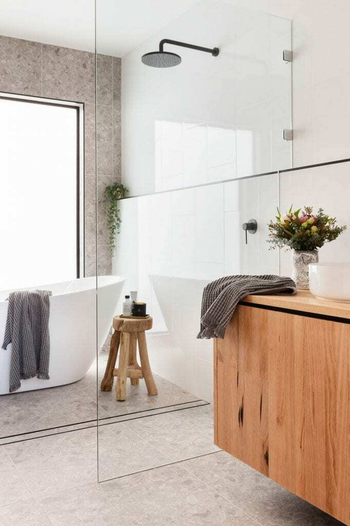 Homes by Howe, new build, Denman, bathroom, wooden vanity looking towards bath