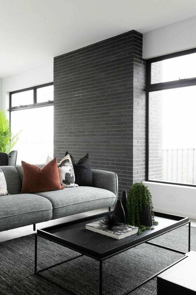 Homes by Howe, knock down rebuild, Red Hill, living room, floor to ceiling windows and sofa