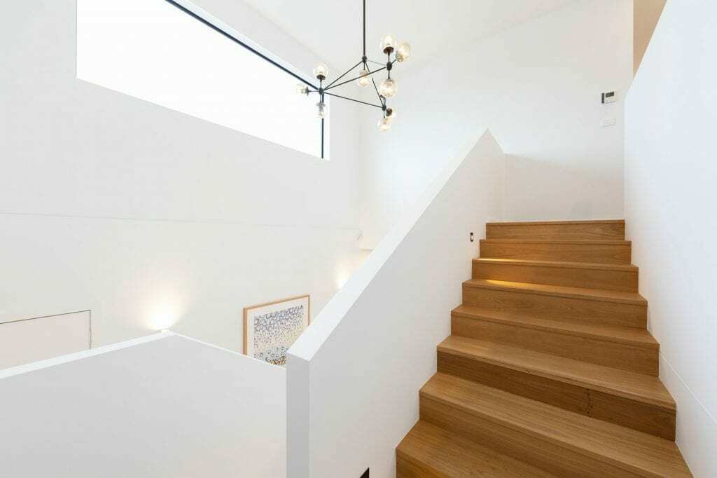 Homes by Howe, knock down rebuild, Red Hill, stairs wood pendant light