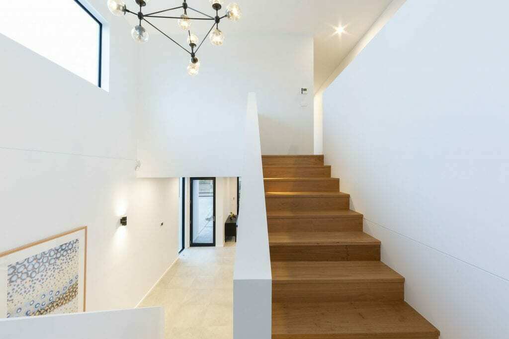Homes by Howe, knock down rebuild, Red Hill, stairs wood pendant light