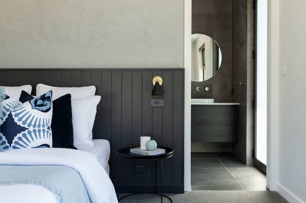 Homes by Howe, knock down rebuild, Red Hill, bedroom, black weathertex panelling behind bed