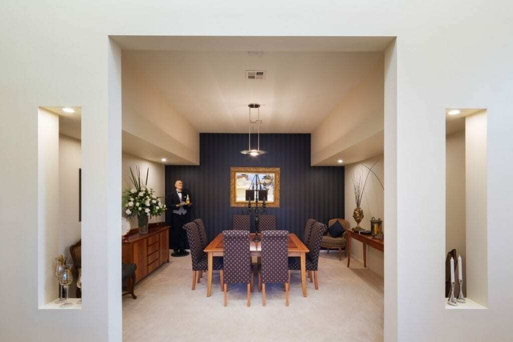 Homes by Howe, renovation, Griffith, dining room, imposing dining room set quite a regal air to the place, blue feature wall at far end