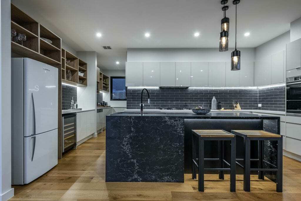 Homes by Howe, new build, Denman, kitchen, midnight marble island with pendants above and wooden flooring