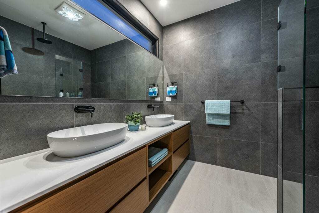 Homes by Howe, new build, Denman, bathroom, dual vanities with mirror above and grey slate tiling