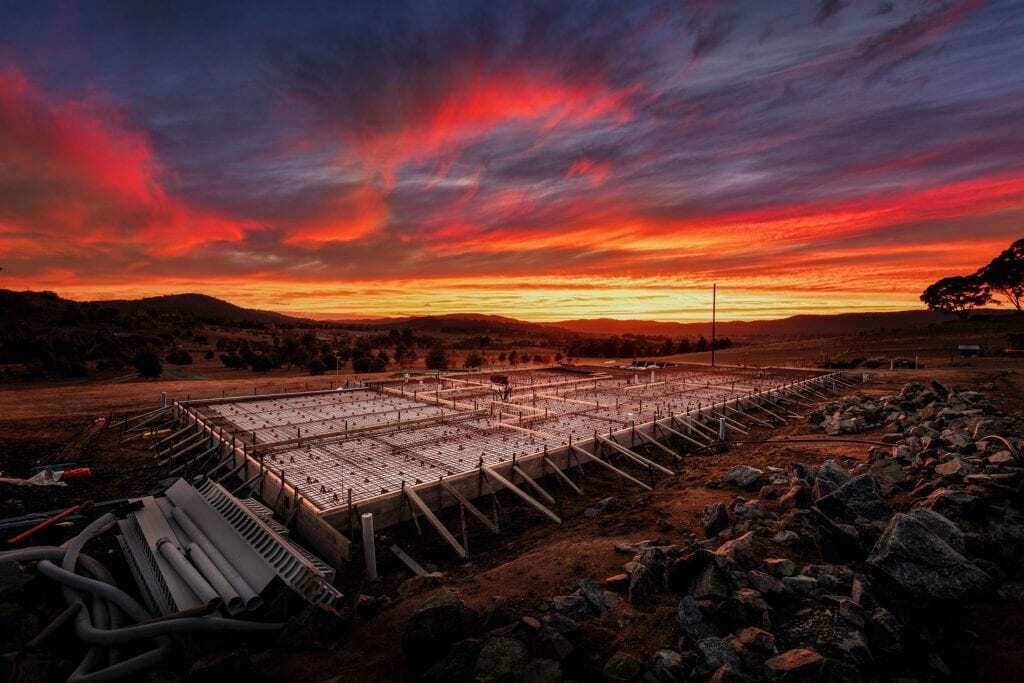 Homes by Howe, Canberra builder, new build, Burra, concrete slab at sunset