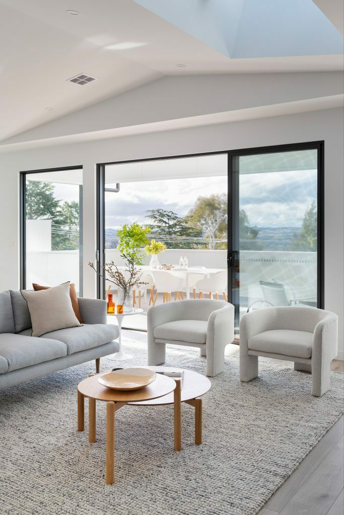 Homes by Howe, knock down rebuild, Chapman, living area opening out onto alfresco balcony
