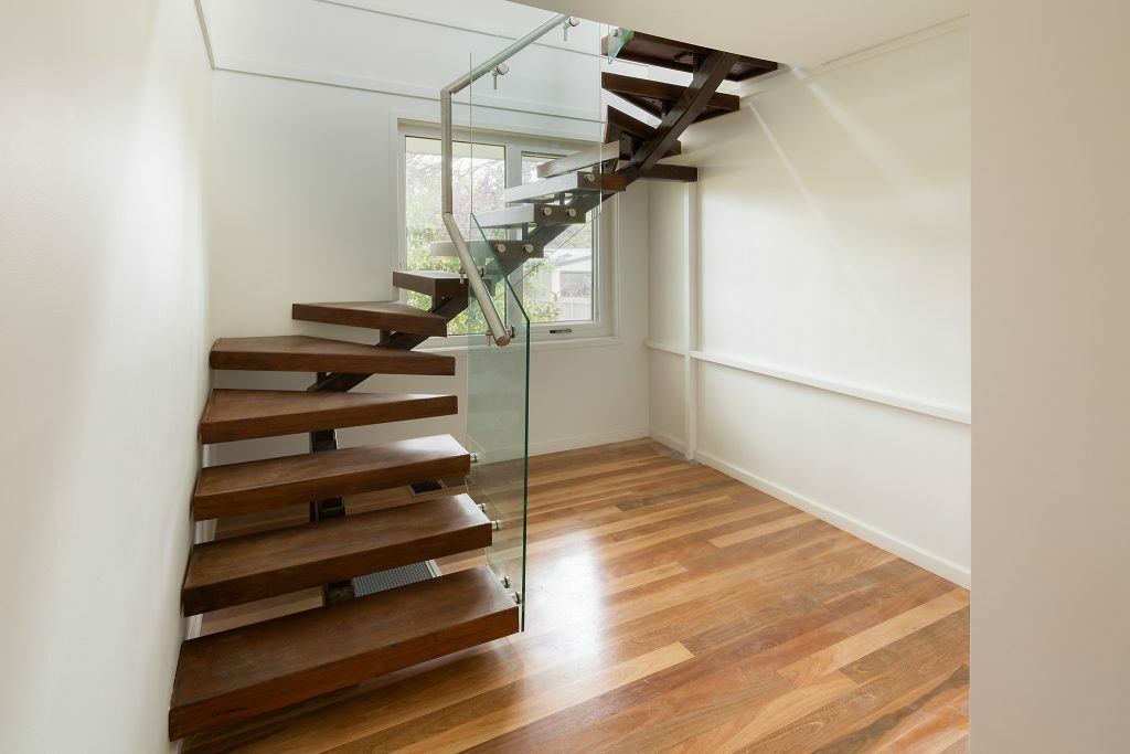 Homes by Howe, renovation, Cook, staircase, glass railing