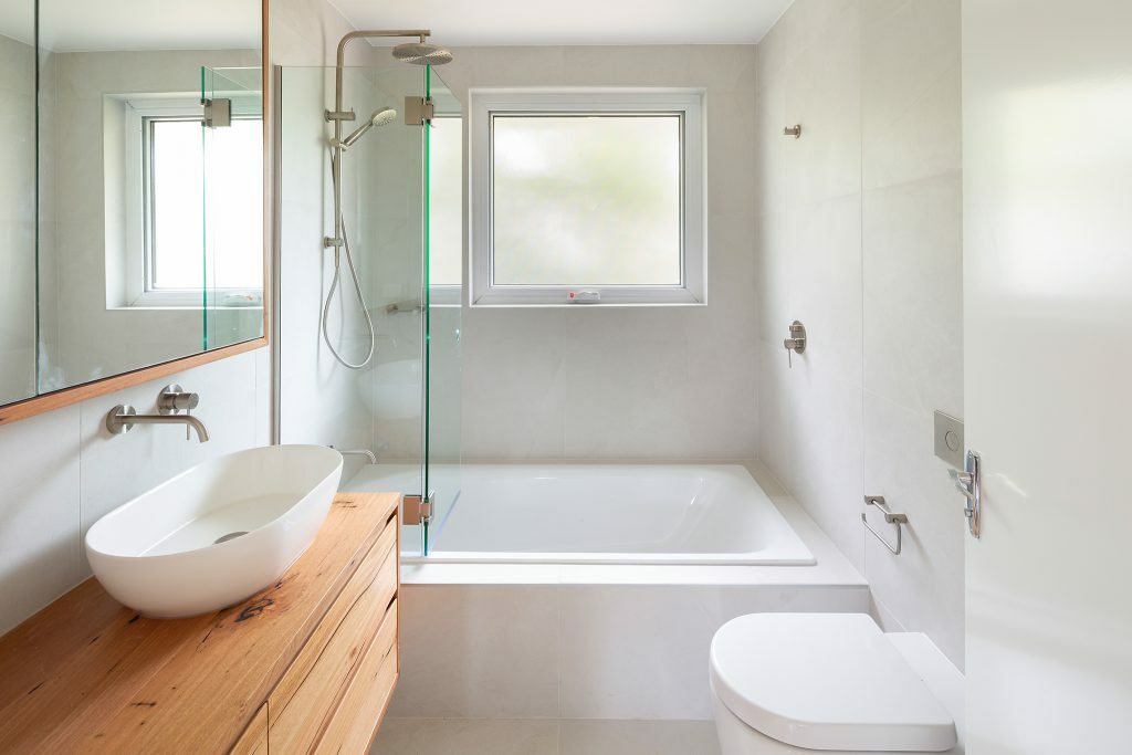 Homes by Howe, renovation, Cook, bathroom, wooden bathroom, combined bath and shower